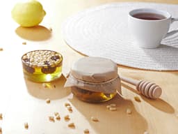 Мед с сосновой шишкой и кедровым орехом 120 гр.